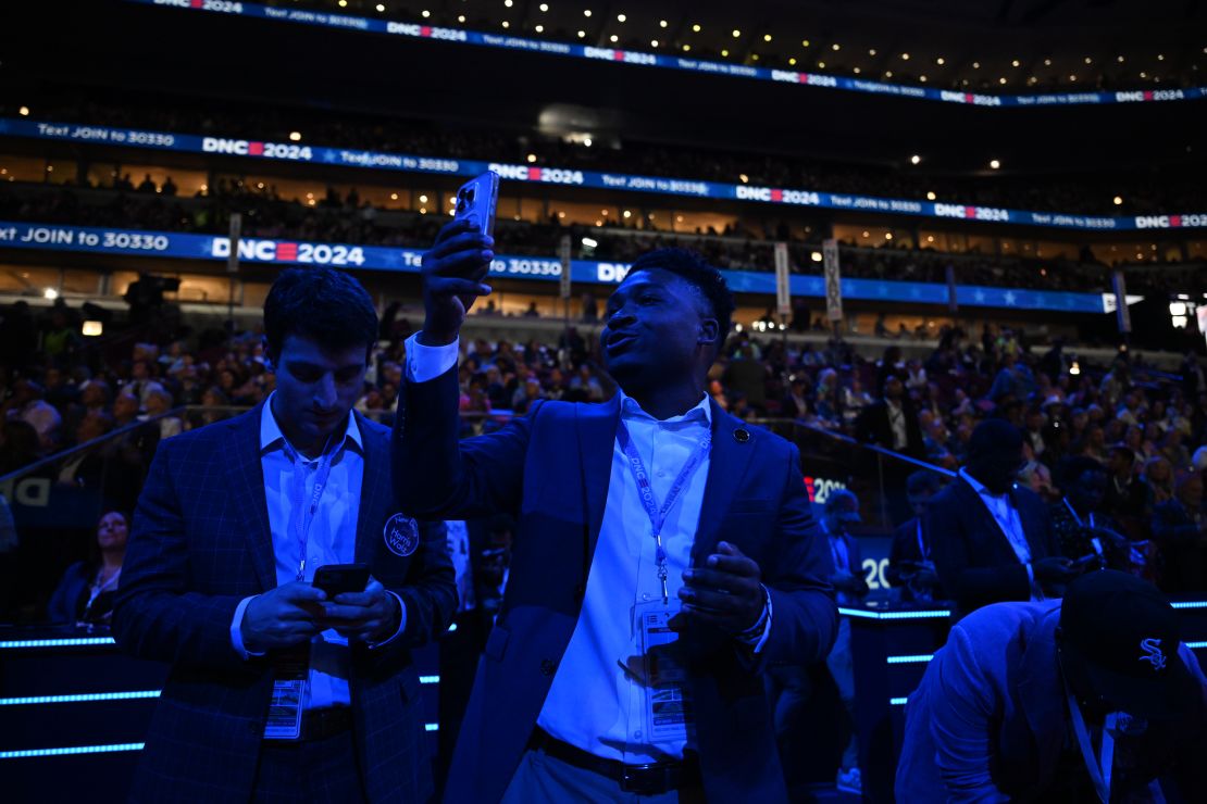 Content creator Joshua Martin records a video from the floor of the 2024 Democratic National Convention in Chicago on August 19, 2024.